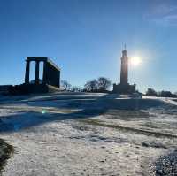 Carlton hill Edinburgh snow , night and day view up in a mountain 