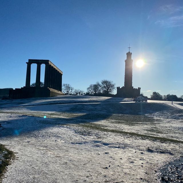 Carlton hill Edinburgh snow , night and day view up in a mountain 