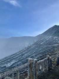 The Turquoise Crater Lake Above the Clouds