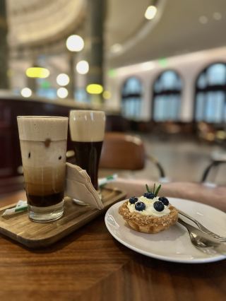 ☕️Starbucks Reserve in Tianjin: Birthday Breakfast Among Marble Columns

Rating: ⭐⭐⭐⭐⭐ (5 out of 5)

Useful Information:
Heping District
📍 Address: 
🇬🇧 Starbucks Reserve Store Henglong Plaza Tianjin is located at 162 Heping Rd, Heping, Tianjin, China, 300021
🇨🇳 Starbucks Reserve Store Henglong Plaza Tianjin, 237 Heping Road, Heping, Tianjin, China, 300021
🕐 Opening Hours: 8:00 AM - 11:00 PM
💰 Average Check: ~¥70–75

😌 Our impressions:
My husband and I visited this Starbucks Reserve Store in Henglong Plaza for breakfast on his birthday. We stopped in out of curiosity, and it turned out to be one of the most pleasant surprises of our trip to Tianjin.

🏰 The first thing that impressed me was the building itself (formerly a bank building). Inside, you truly feel like you've stepped into another era: the huge dome, marble columns, and antique details. The atmosphere is so unique that many compare the interior to Hogwarts or Gringotts Bank.

We just had breakfast, but the place itself left a strong impression.

😳 And here's what was a revelation for me: a separate bar counter with a menu of alcoholic and coffee drinks. I've never seen anything like this before at a Starbucks. Of course, we immediately wanted to try the local flavor 🤭, and it was very unusual.
Starbucks Reserve is generally known for its sophisticated concepts 🤌🏼. You can feel the class here, and every detail is thought out.

The breakfast was delicious, and the atmosphere was pleasant. A great place to start a birthday or just a morning in Tianjin.
🫰I recommend it to anyone who appreciates such establishments. There's plenty to enjoy and taste.