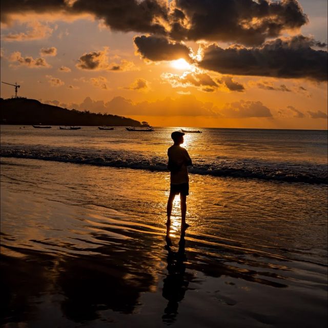 Beautiful sunsets at the jimbaran beach in bali 