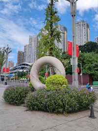 Doughnut Frames the Skyline: A Sweet Urban Snapshot