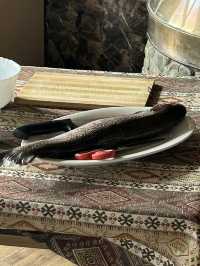 Traditional fish cooking by the lake 