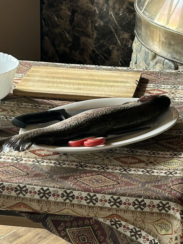 Traditional fish cooking by the lake 