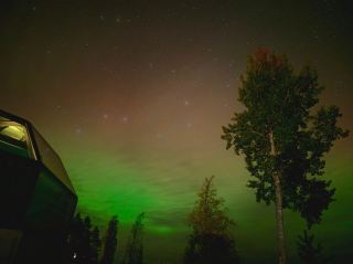 A September Spark: Watching Northern Lights Dance from bed!