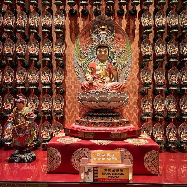 Praying at Buddha Tooth Relic Temple