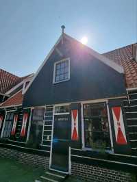 Volendam Vibes: Boats, Breezes, and Bright Houses