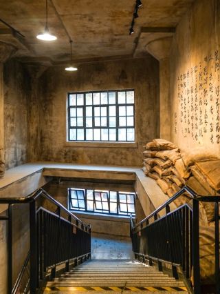 The actual location of the wall, with bullet marks from the war against Japan.