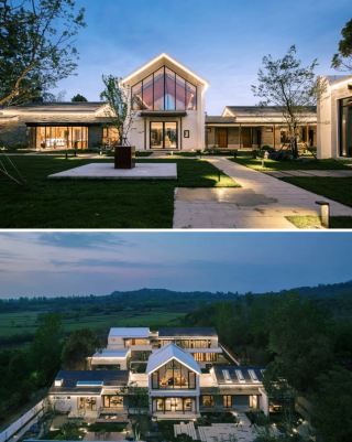 A tranquil residence surrounded by green mountains, perfect for a getaway from the city. 