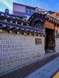 Bukchon Hanok Village: Time-Travel Through Seoul’s Most Photogenic Alleys"** 🏮🏡