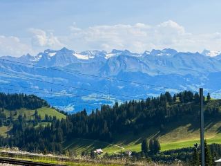 Lucerne's 'Mount Rigi' with a breathtaking view of a vast lake