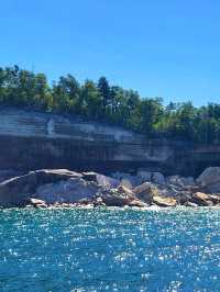 Discover the wild beauty of the crystal blue water and sandstone cliffs along Lake Superior in MI
