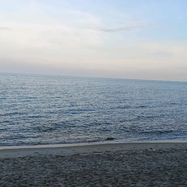 Beautiful beach with avocado smoothie, chill