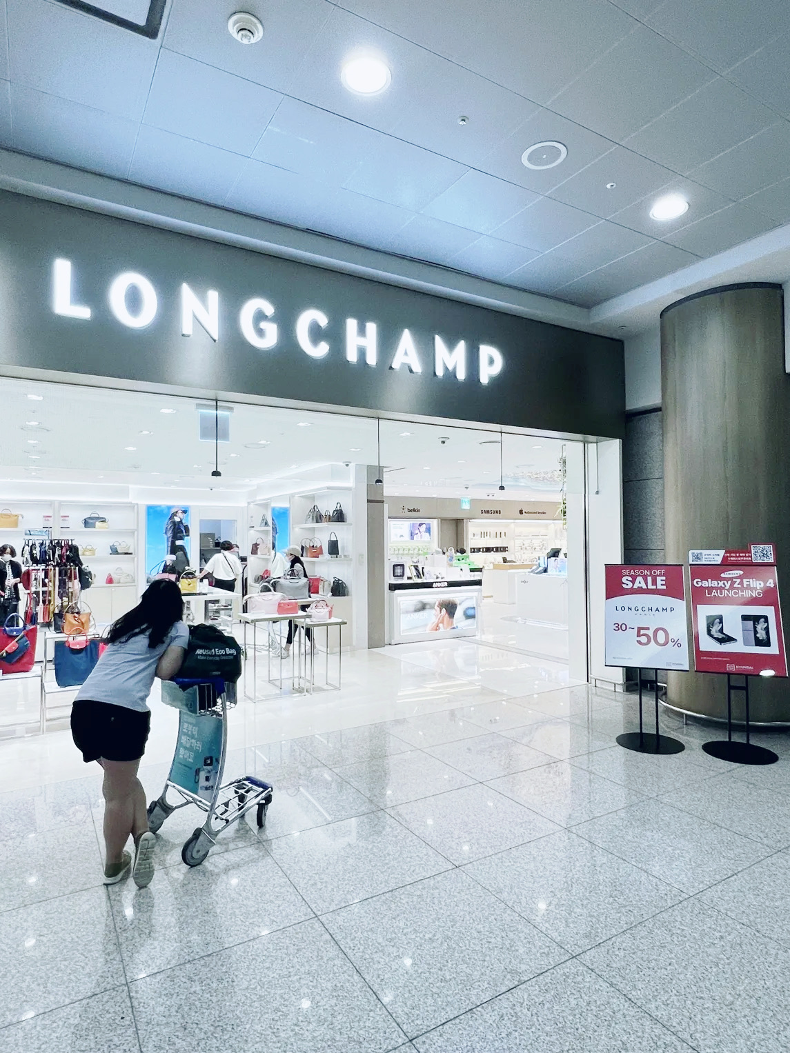 Longchamp schiphol airport hot sale