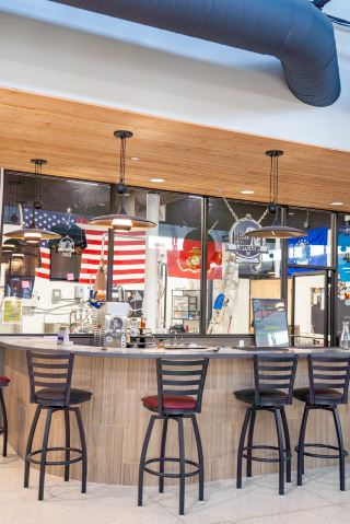 Grand Central at Milam: Food Counter, Market Shelves, and Drink Case