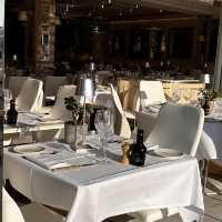 Upscale dining paired by a port view!