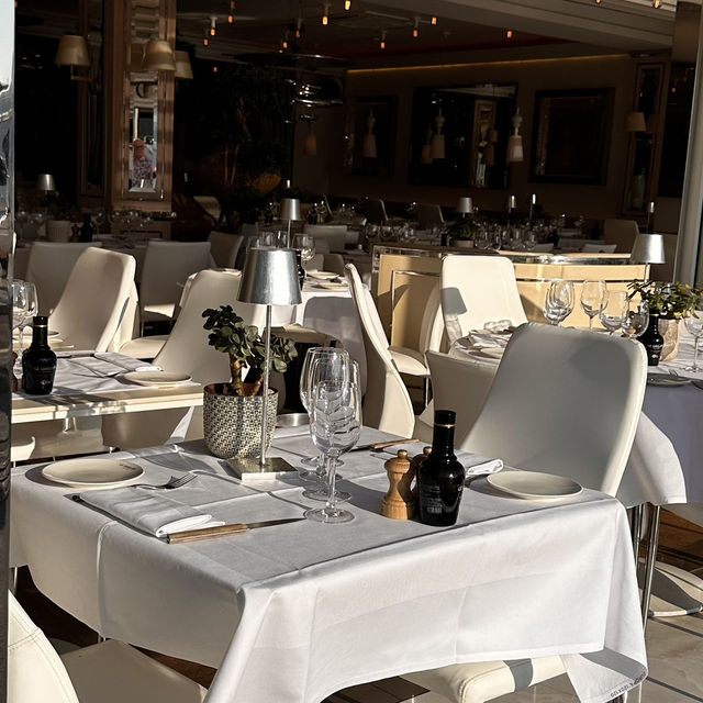 Upscale dining paired by a port view!