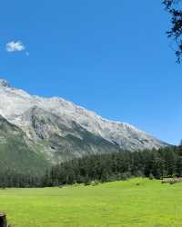雲杉坪打卡隱藏在玉龍雪山的巨大草坪