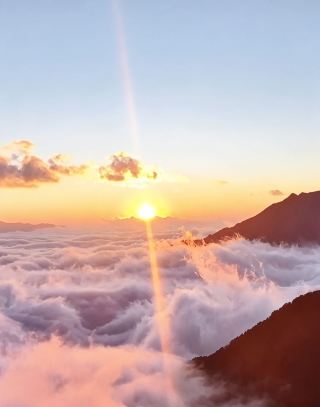 Sunrise and Sea of Clouds with Golden Radiance at 4000 Meters Altitude
