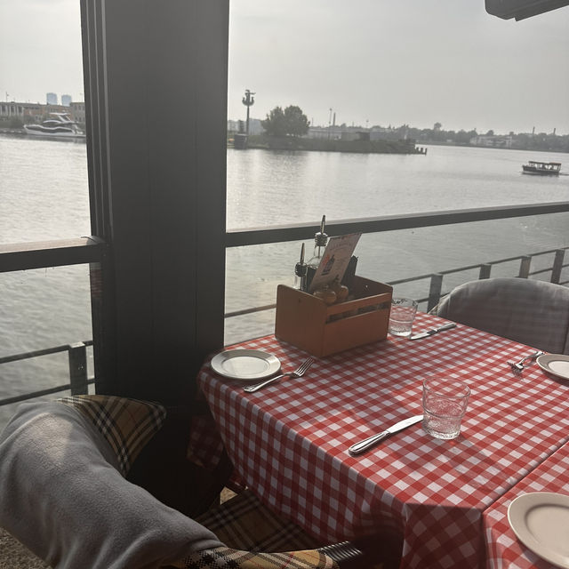 Enjoy delicious pasta by the canal!