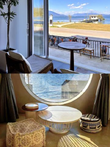 Из окон отеля Dali Erdong Fengshen Seaview открывается непревзойденный вид на озеро Эрхай, словно вы находитесь прямо в своем номере.