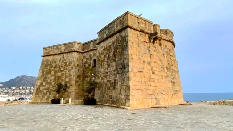 A small castle on the beach ~ The best place to watch the sunset. — traveler post in Teulada