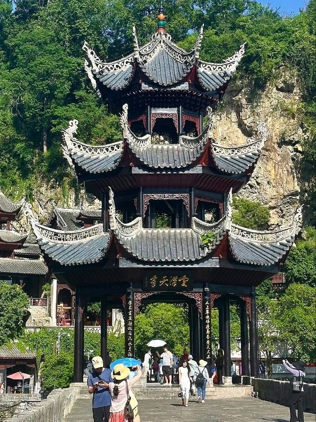 “The Cliff Temple Above the Emerald River”