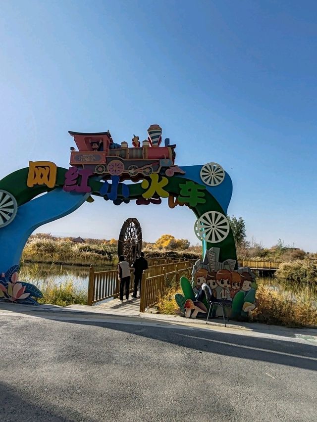The Fairy-Tale Train Through Golden Populus Forests The Fairy-Tale Train Through Golden Populus Forests