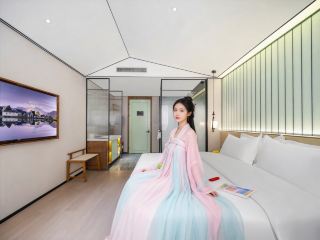 อยู่ติดกับเมืองแกะสลักหยกเจิ้นผิง! การได้พักในโรงแรมสไตล์จีนดั้งเดิมนั้นวิเศษมาก!