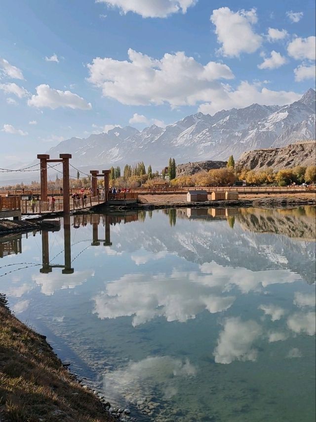 Reflections of Snow Mountains on the Golden Grassland: A Mirror Painting of the Pamir