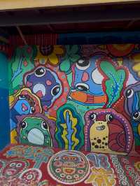 Rainbow Village: A Colorful Legacy of Rainbow Grandpa's Art