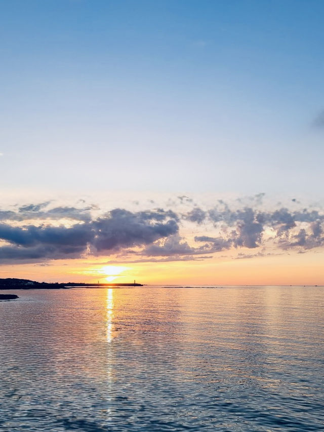 Jeju's Iconic White Sand and Emerald Waters with Island Views