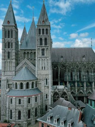 #europeonbudget
🏰 Tournai – Belgium’s Ancient City of Cathedrals & Culture 🇧🇪✨

📍 Location: Western Belgium, near the French border 🇫🇷
💶 Ticket Price: Free to explore; Tournai Cathedral Tower (€2–5), Belfry (€3) 🎟️
🕰️ Opening Hours: Open year-round; best from April to September 🌸☀️

🌟 Highlights:
Tournai is one of Belgium’s oldest and most historic cities, rich with medieval charm and timeless beauty 💫. Visit the stunning Notre-Dame Cathedral of Tournai ⛪ – a UNESCO World Heritage Site with five majestic towers reaching for the sky 🕊️. Climb the Tournai Belfry, Belgium’s oldest belfry 🏰, for sweeping views of the city skyline 🌇.

Wander through the Grand Place, lined with colorful houses and cozy cafés ☕, or explore Museum of Fine Arts, designed by the legendary Victor Horta 🎨. The museum features works by Rubens, Manet, and Monet – a delight for art lovers 🎭.

🍴 Enjoy local dishes like Tournai-style rabbit stew 🐇, crispy Belgian fries 🍟, and creamy cheeses 🧀 paired with a cold Belgian beer 🍺.

🚆 How to Reach:
About 1 hour 20 minutes by train from Brussels 🚄 or 30 minutes from Lille, France. The city is compact and best explored on foot 🚶♀️.

💖 With its grand cathedral, medieval streets, and peaceful river views, Tournai is a hidden treasure that beautifully tells Belgium’s oldest stories 🌟

#Tournai #VisitBelgium #NotreDameCathedral #TournaiBelfry #GrandPlace #UNESCOHeritage #BelgianHistory #EuropeTrip #TravelWithZara #ExploreTournai


