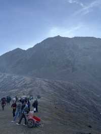 The Turquoise Crater Lake Above the Clouds