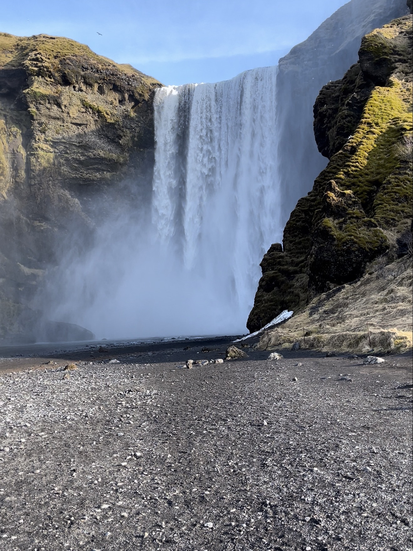 🇮🇸 Skógafoss | Iceland 🌊💚
A spectacular waterfall in Iceland that you'll want to admire in person.

If you're visiting Iceland, one place you absolutely shouldn't miss is Skógafoss. This large waterfall in the south of the country is one of the most famous and a popular stop for those driving along the Ring Road.

Just walking from the parking lot, you'll see the massive waterfall prominently situated between cliffs. The closer you get, the more impressive it becomes – even bigger than in the pictures! Water cascades down from a 60-meter-high cliff, the sound of the water is constant, and mist fills the air.

What I loved most was the sight of the white waterfall cascading down against the black rock cliffs and green moss. Some parts of the cliff are illuminated by the sunlight, turning a golden-green color. Combined with the blue sky, it's incredibly beautiful; a truly natural masterpiece that needs almost no enhancement. 📸

The area in front of the waterfall is paved with black gravel and rocks, typical of Icelandic landscapes. You can get relatively close to the waterfall, but the closer you get, the wetter you'll become from the mist. If you plan to take photos, I recommend bringing a waterproof jacket or coat.

Another interesting point is that if you visit on a sunny day with perfect lighting, the view is stunning. You might even see a rainbow in the mist, adding to the beauty of Skógafoss.

For those who still have the energy to walk, there are stairs leading to a viewpoint at the top of the waterfall. From there, you can see the water from a different angle, but the stairs are quite steep and have many steps. If you plan to climb, allow extra time and wear comfortable walking shoes.

Personally, I liked the view from the bottom the most. You can see the entire waterfall from the top down to the mist below. The longer you stand and gaze, the more you feel the grandeur of nature. The sound of the water and the cool breeze make for an unforgettable experience.

Skógafoss might be a waterfall you've seen many times in photos, but standing in front of it feels completely different – ​​the size, the sound of the water, and the mist you can feel. It's a place that photos can't fully capture.

If you're planning a trip to southern Iceland, I highly recommend adding Skógafoss to your itinerary. Especially for those who love nature, waterfalls, and mountain views, this place is definitely worth a visit 🤍

📍 Skógafoss Waterfall, Skógar, South Iceland 🇮🇸

#Skogafoss #SkogafossWaterfall #Iceland #SouthIceland #IcelandRoadTrip #TravelIceland #TravelEurope #TravelReview #TravelAbroad