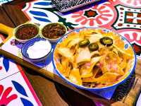 Awesome decor serves Mexican food with live band in Holy Guacamole