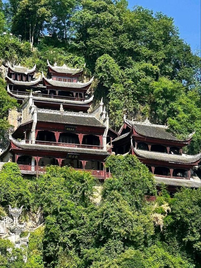 “The Cliff Temple Above the Emerald River”