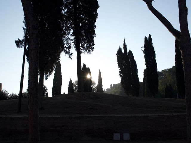 Walking in Rome by the Colosseum 