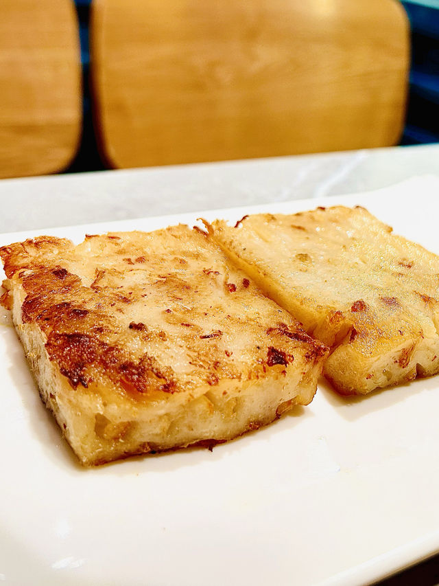「新記食熱辣辣既生滾雞粥，必食之選」