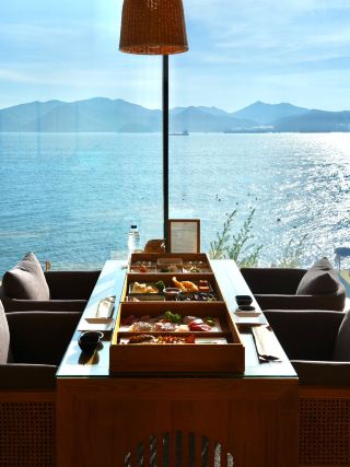 A pool villa with panoramic ocean views from every room