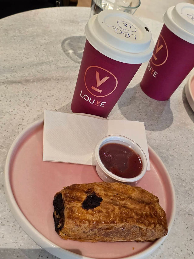 Elegant Brews with a Courtyard Escape at Louve