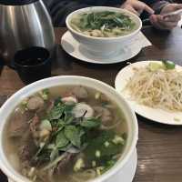 Hot pho (Vietnamese noodles soup) in a cold snowy day