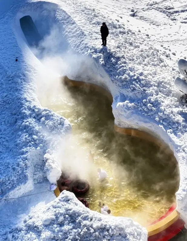 Shenyang locals are amazing, a snow slide that leads directly to a hot spring