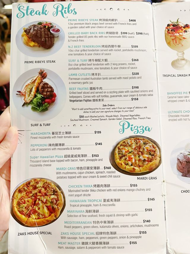 愉景灣海邊飲勁大杯芒果汁