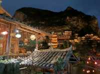 Buyi Village by Night – Where Firelight Meets Folklore Under a Starry Sky