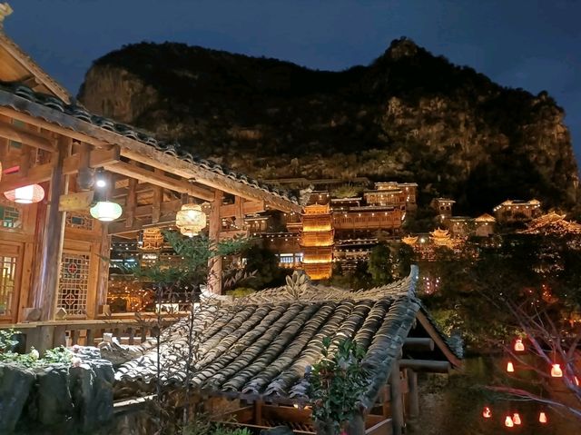 Buyi Village by Night – Where Firelight Meets Folklore Under a Starry Sky