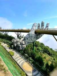 Walking Above the Clouds at Golden Hans Bridge at Ba Na Hills, Vietnam