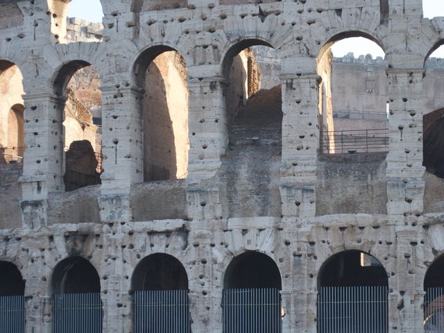 Walking in Rome by the Colosseum 