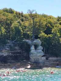 Discover the wild beauty of the crystal blue water and sandstone cliffs along Lake Superior in MI