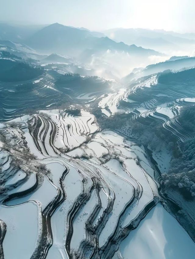 航拍視角下的從江縣梯田冬雪奇觀！